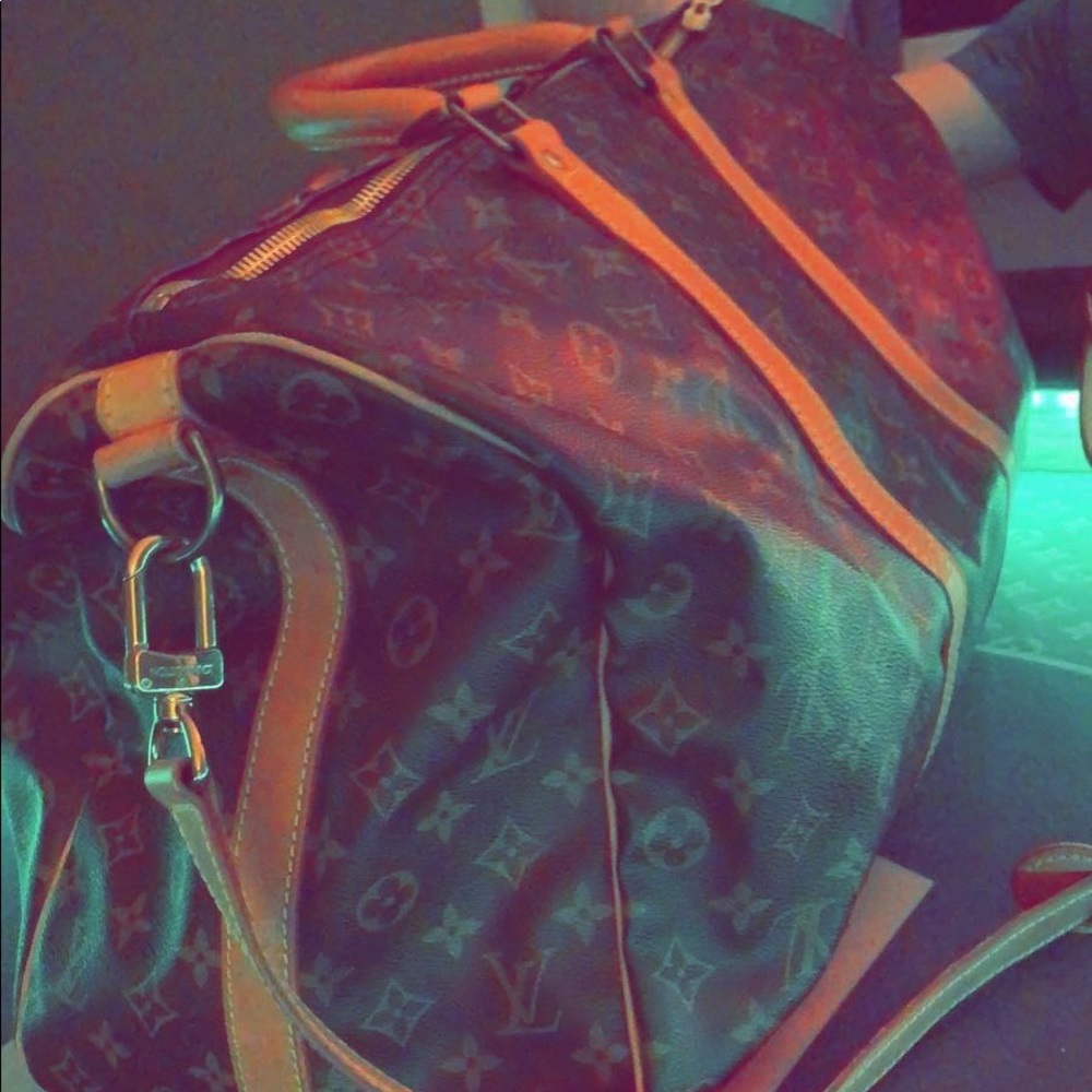 Louis Vuitton keepall 50 with strap. Authentic.